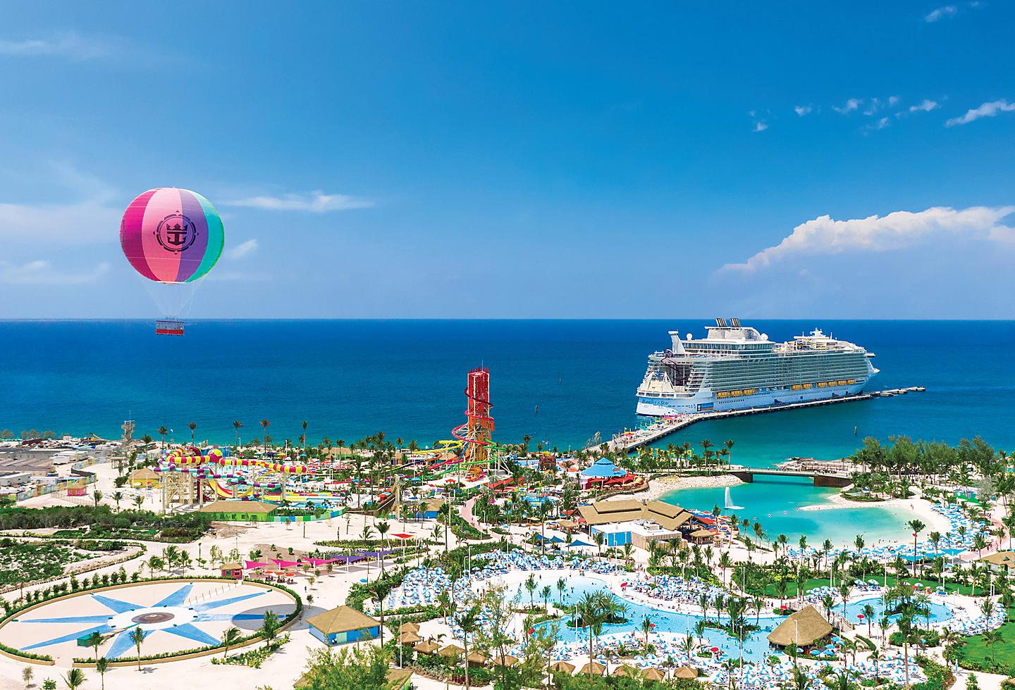 Book a cruise ship with a water park in the background through our travel agency. by Chasing the Sun Vacations